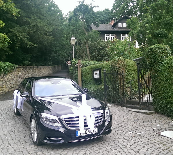 Wedding limousines with chauffeur and festively decorated in Munich